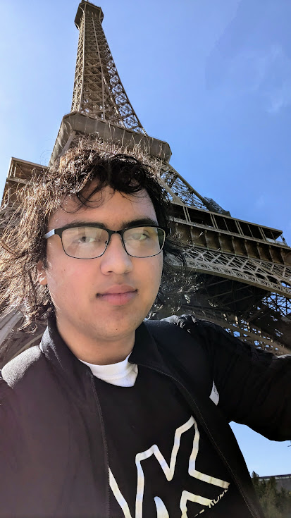 Picture of me in front of the Eiffel tower